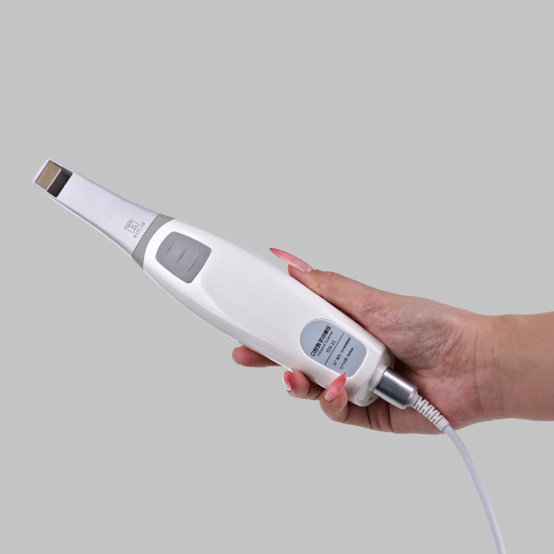 Hand holding a white electronic device with a gray handle on a light gray background